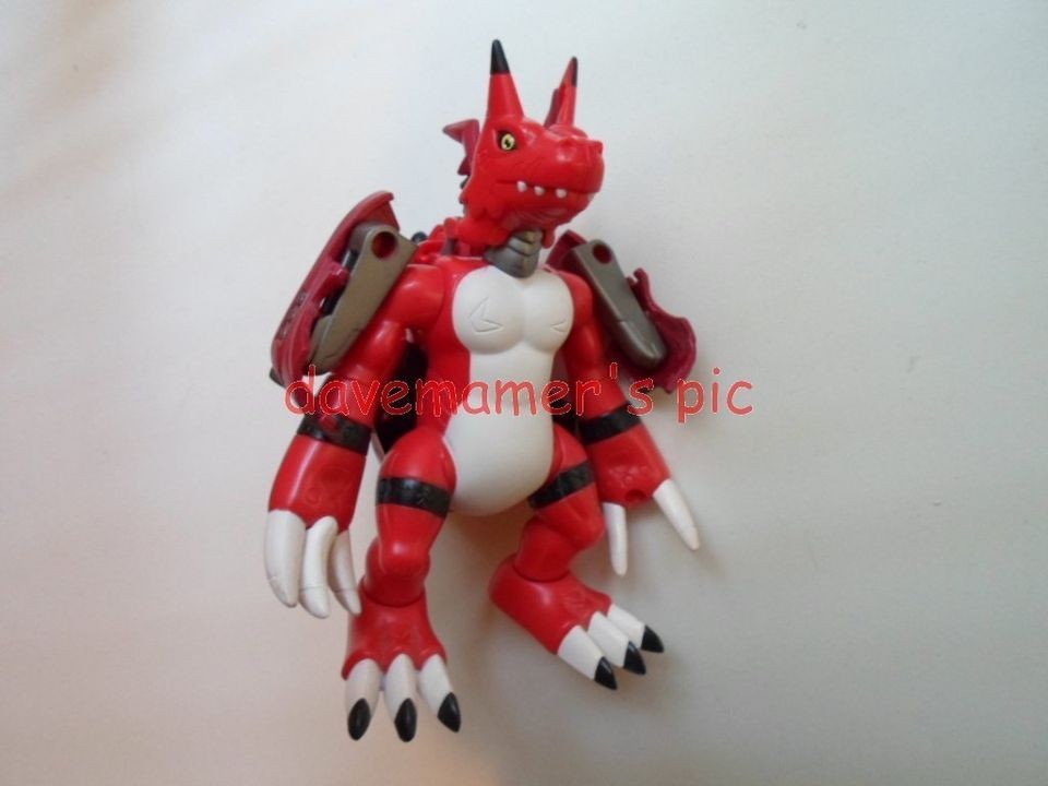 Digimon by Bandai Digivolving GROWLMON figure to Wargrowlmon