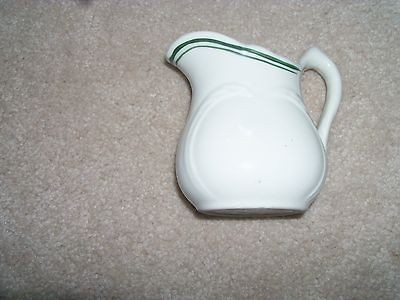   China Creamer   White w/ Green Stripe and Design   USA   Unknown Maker