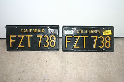   Pair / Set of Black and Yellow California Liscense Plates w/ stickers