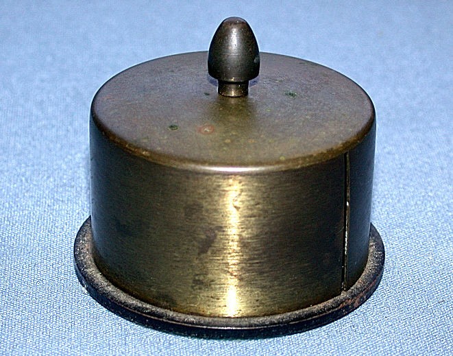   Brass Roll Stamp Dispenser With Lots of Patina & Green Felt Bottom