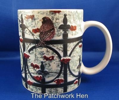   Mug On The Fence by Sherri Buck Baldwin, Bird on Iron Garden Fence