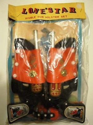 cowboy gun lone star double gun holster set tin toy