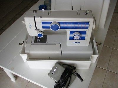 white sewing machine model 1415  150 00