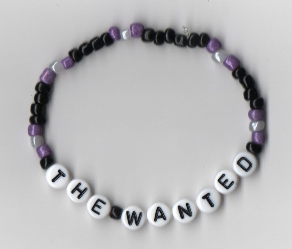 Handmade purple and black bracelet   choose a caption listed or 