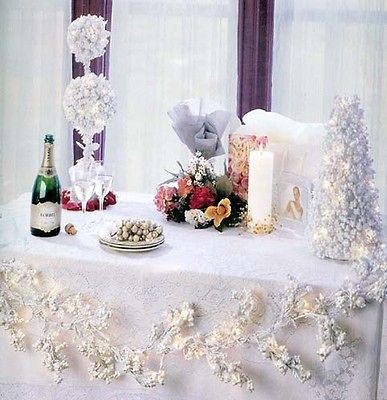 pre lit white berry garland with clear lights 179941