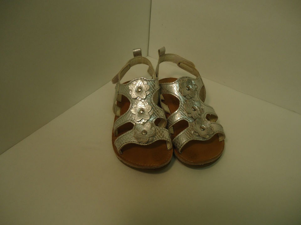   SIZE LARGE SILVER SANDLES W/ THREE FLOWERS ON EA. OKIE DOKIE GIRLS