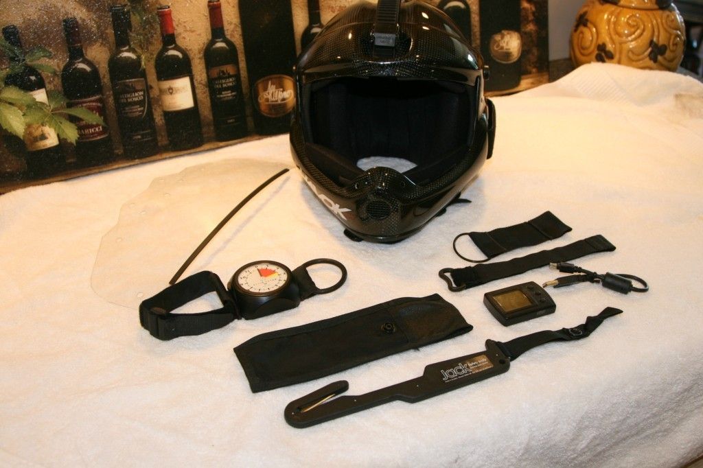   bundle pack bone head helmet, 2 altimeters, saftey knife, flight suit