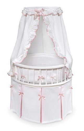 white wood round baby girl bassinet crib bed pink trim