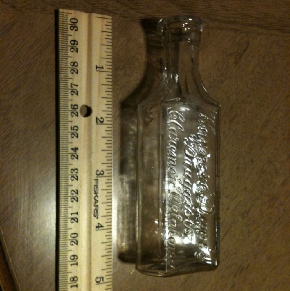 CLAREMORE OKLAHOMA DRUGGIST BOTTLE EMBOSSED