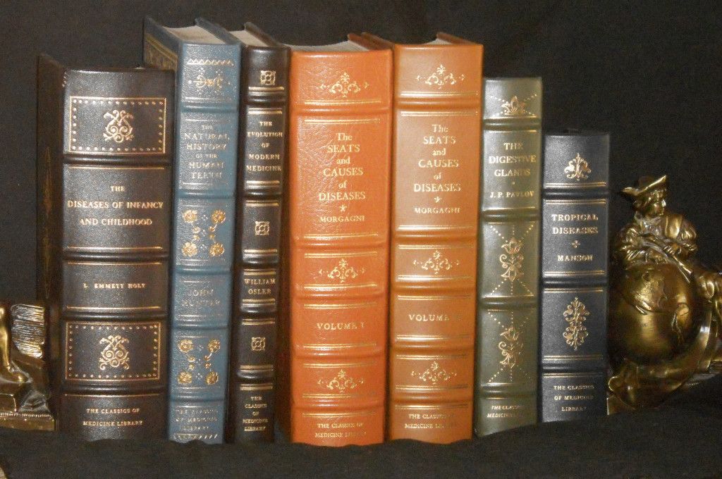 SHELF OF CLASSIC MEDICAL & DENTAL BOOKS. FINE LEATHER BINDINGS.