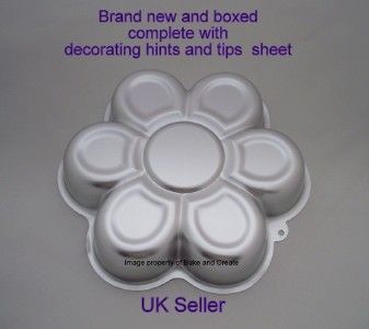 DAISY/ FLOWER POWER/ BIRTHDAY CAKE TIN NEW 4 VW CAMPER VAN FANS WITH