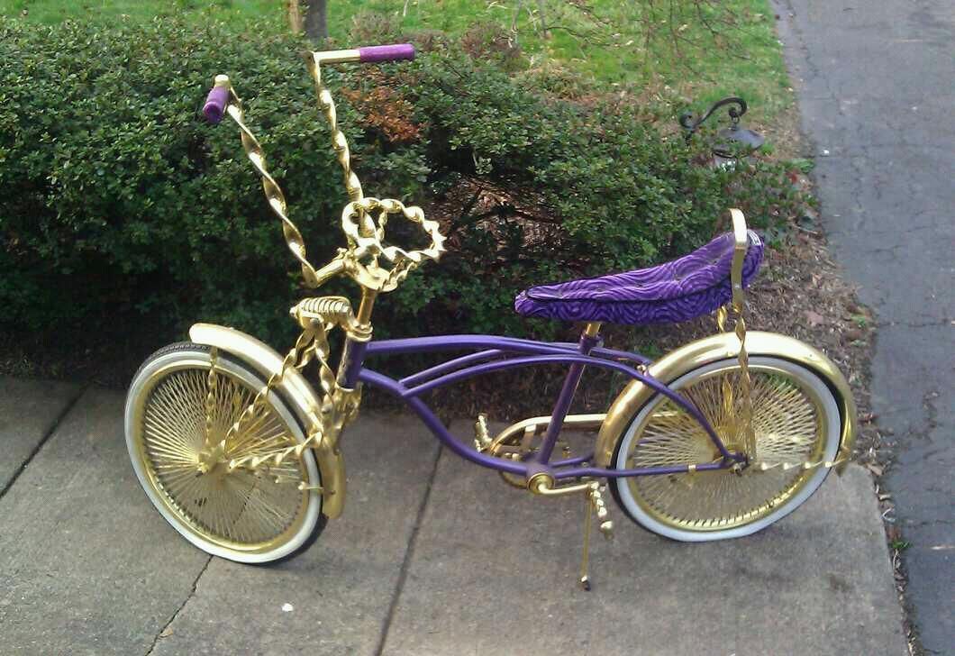 black and gold lowrider bike