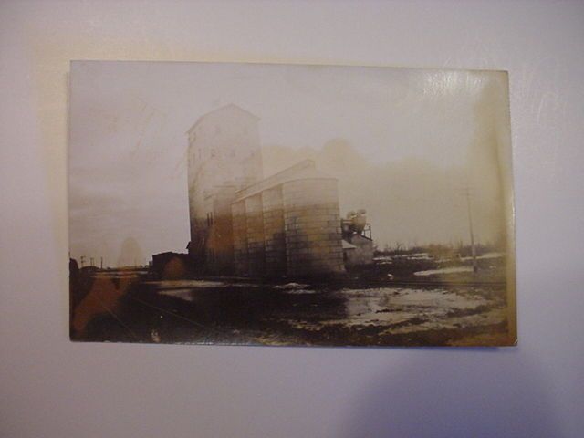 RPPC Silo ? Silos Grain Elevator ? along Railroad tracks Postcard